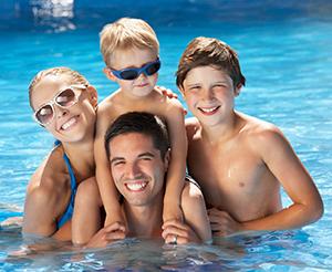 Happy family bathing