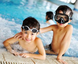 2 little boys in the swimming pool